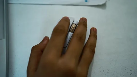 Close-Up of Hand Using Computer Mouse, A close-up of a hand using a compute.. Stock Footage 304978304