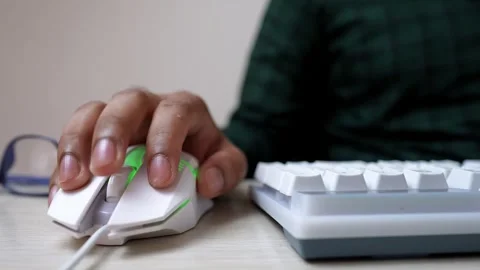 Close-up of Hand Using Computer Mouse and Keyboard Stock Footage 317737142