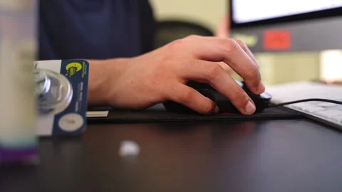 Close Up Hand Using Computer Mouse at Desk Stock Footage 335200329