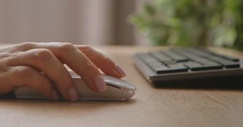 Close up of Hand Using a Computer Mouse Stock Photos