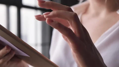 Close Up Of Hand Using Computer Touch Screen. A Young Business Woman Stock Footage 135752744