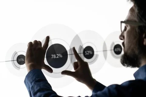 Close up of hand using creative business chart hologram settings on tech Foto stock