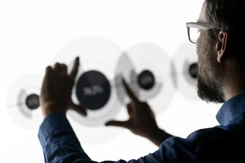 Close up of hand using creative business chart hologram settings on tech Foto stock