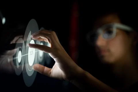 Close up of hand using creative business chart hologram settings on tech Foto stock