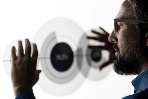 Close up of hand using creative business chart hologram settings on tech Foto stock