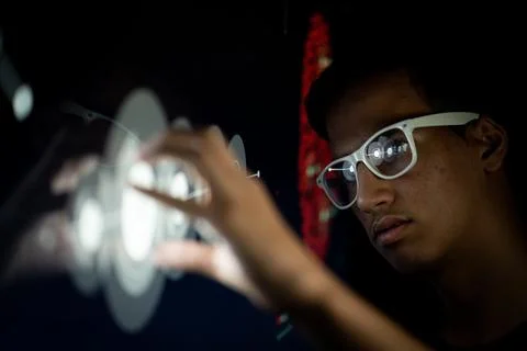 Close up of hand using creative business chart hologram settings on tech Foto stock