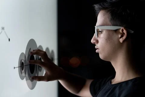 Close up of hand using creative business chart hologram settings on tech Foto stock