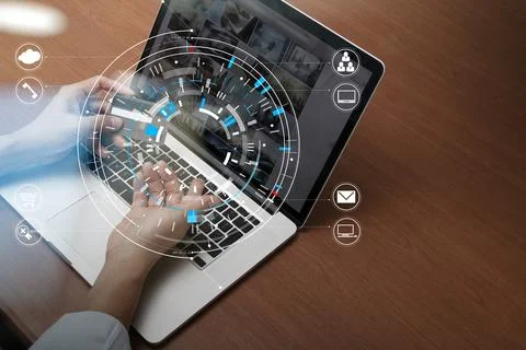 Close up of Hand using credit card and laptop computer on wooden desk with .. Stock Photos