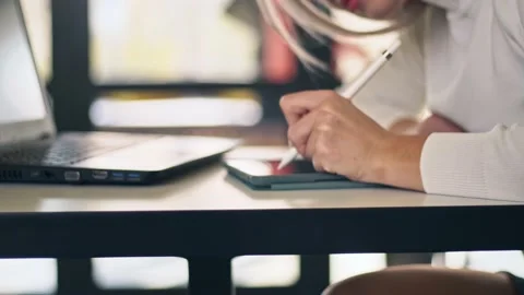 Close up hand using digital tablet drawing with stylus pen graphic. Businessw Stock Footage 143272478