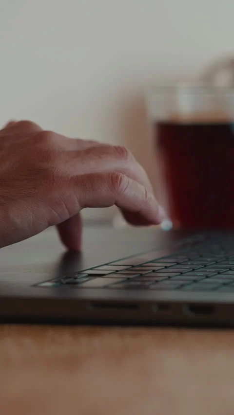 Close-Up Of Hand Using Laptop Trackpad At Home For Work Stock Footage 334633863