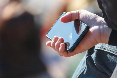 Close-up of hand using mobile phone 스톡 사진