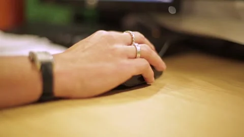 Close-Up of Hand Using a Mouse at a Modern Office Desk Stock Footage 297370697