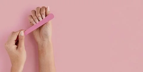 Close up hand using nail file Resolution and high quality beautiful photo Stock Photos