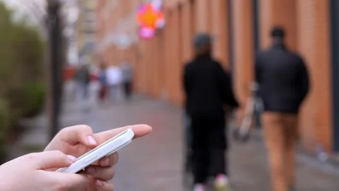 Close-up of hand using phone Stock Footage 340957134