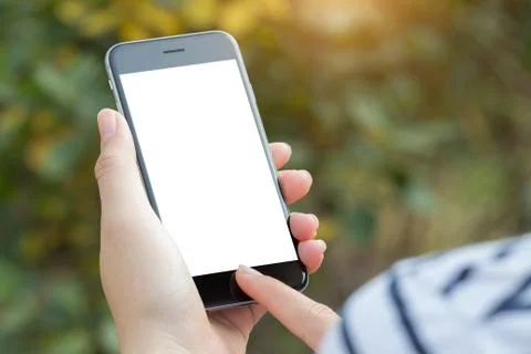 Close up hand using phone white screen Stock Photos