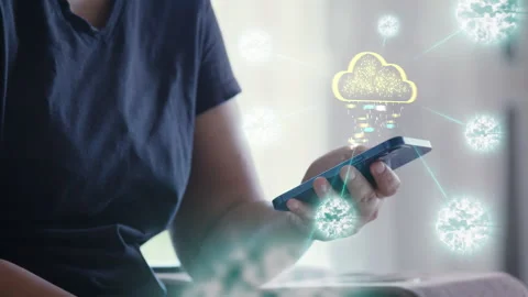 Close-up on hand using smart phone with cloud computing virtual interface. Stock Footage 343952457