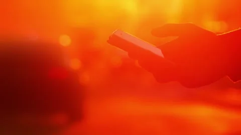 Close up hand using smartphone car online ordering taxi app mobile network Stock Footage 257237644