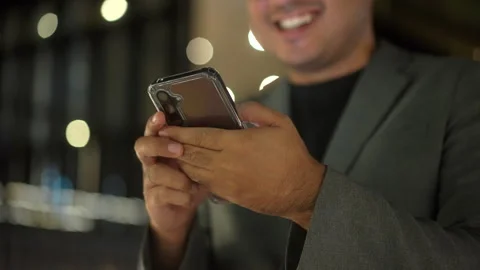 Close-up hand using smartphone to communication of business and play social. Stock Footage 243252213