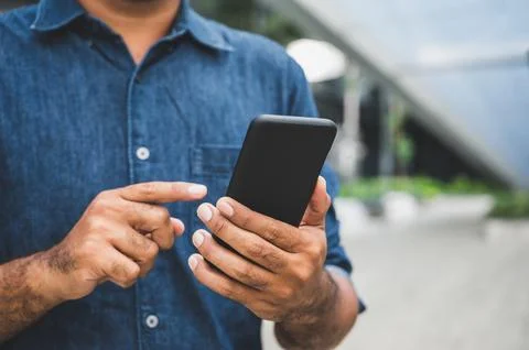 Close up hand using smartphone Stock Photos