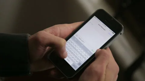 Close up of a hand using smartphone, texting and send sms. Stock Footage 56238317