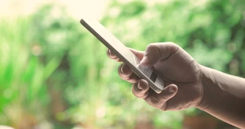 Close up hand using smartphone touching a display screen , 4K Dci resolution Stock Footage 92510008