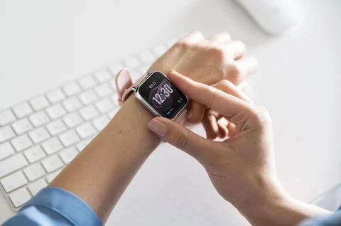 Close up hand using smartwatch Stock Photos