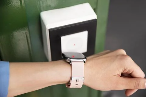 Close up hand using smartwatch for security close up Stock Photos
