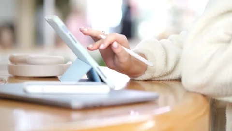 Close-up of hand using stylus on tablet Stock Footage 347312806