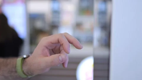 Close-up of hand using tablet in public space 库存影片 340960057