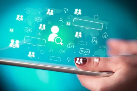 Close-up of a hand using tablet, social media concept Stock Photos