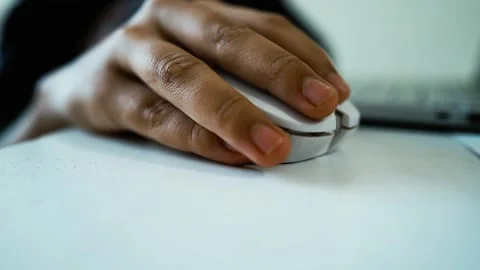 Close-Up of Hand Using White Computer Mouse, Close-up of a hand using a whi.. Stock Footage 304978180