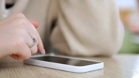 Close-up hand using white smartphone 스톡 동영상 340920523