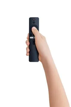 Close up of hand using wireless tv remote controller isolated on white back.. Stock Photos