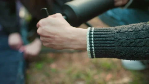 Close Up Hand View of Person Pumping Air with Hand Pump Outdoors Vidéo 310485663