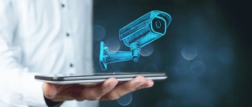 Close - up of hand of virtual camera with security icons coming out of it, .. Foto stock