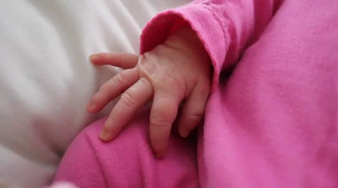 Close-up of the hand of a waking baby Stock Footage 54282839