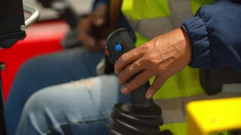 Close Up / Hand of Warehouse Worker operating Handle of Machine  Vidéo 131956430
