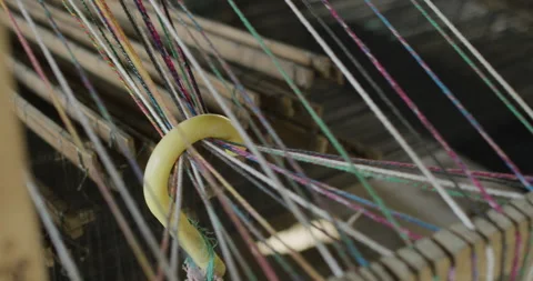 Close up of hand weaving machine in Guatemala with colorful yarn Stock Footage 227604238