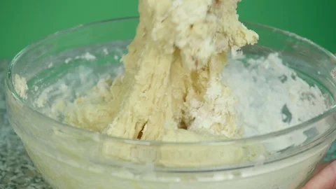 Close up of hand while mixing the dough for baked goods - green screen backgr Stock Footage 126606831
