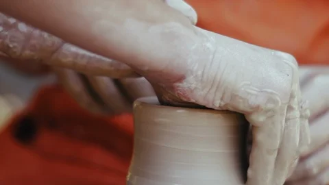 Close-up, Hand of the Woman Master Processes Clay, Creates A Pitcher on the Stock Footage 123003393