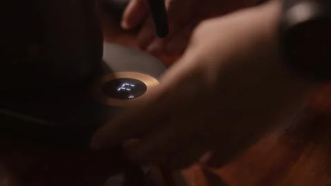 Close up hand of  woman setting the temperature on an electric kettle. Stock Footage 328066932