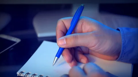Close-up of a hand write with a pen. Stock Footage 59846795