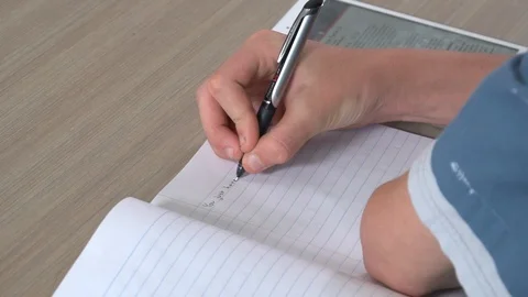 Close up of hand writing Stock Footage 99375318