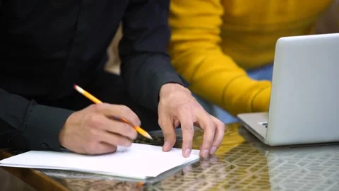Close-Up of Hand Writing in Notebook Vídeo Stock 339094600