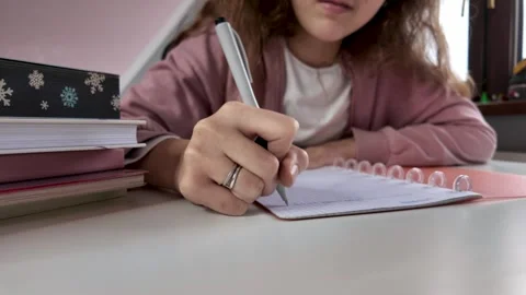 Close-up of hand writing in notebook with pen, education concept Stock Footage 328420734
