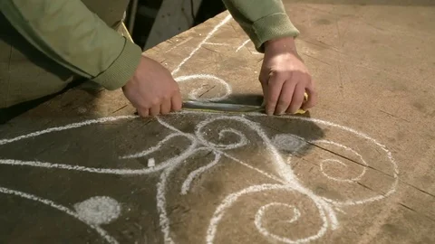 Close-up hand of a young blacksmith who measures and sign sketch on the table Stock Footage 76362949