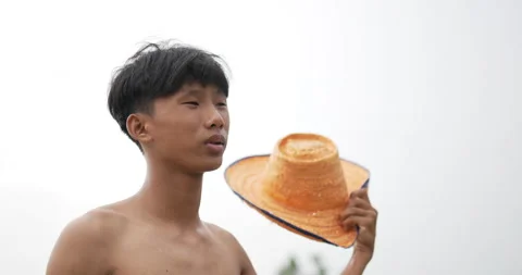 Close up, Hand of young farmer with topless is planting young rice in the field Stock Footage 202054355