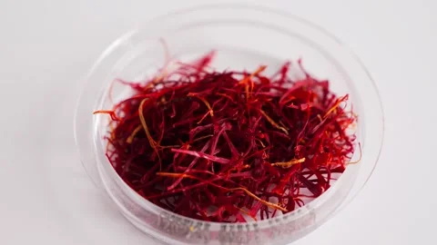 Close-up of a handful of saffron threads. Premium spice. Stock Footage 337623709