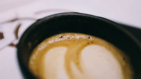 Close-up handheld shot of cup of coffee Stock Footage 122514570