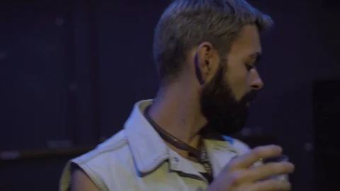 Close-up handheld shot of man and woman dancing in the nightclub Stock Footage 114876319
